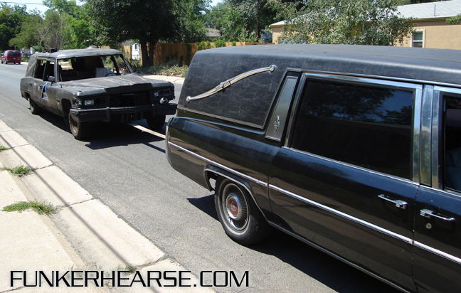 pulled by another hearse,